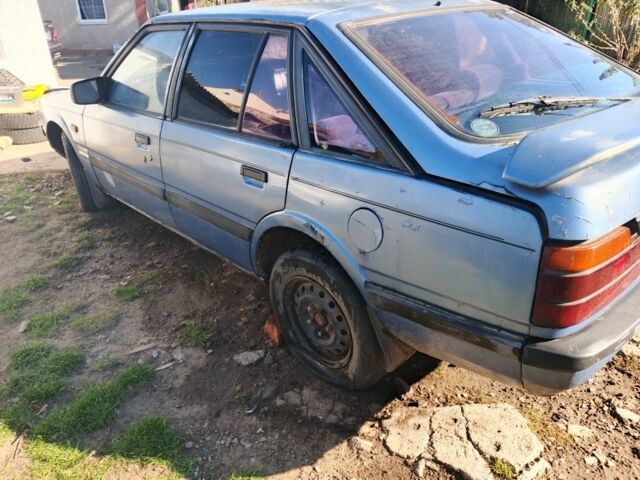 Синий Мазда 626, объемом двигателя 1.6 л и пробегом 100 тыс. км за 200 $, фото 4 на Automoto.ua