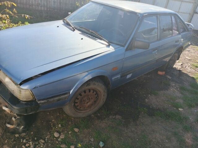 Синий Мазда 626, объемом двигателя 1.6 л и пробегом 100 тыс. км за 200 $, фото 2 на Automoto.ua