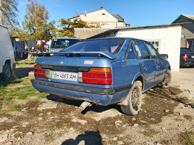 Синий Мазда 626, объемом двигателя 1.6 л и пробегом 100 тыс. км за 200 $, фото 1 на Automoto.ua