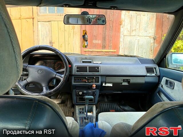 Синий Мазда 626, объемом двигателя 1.6 л и пробегом 380 тыс. км за 300 $, фото 2 на Automoto.ua