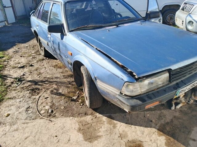 Синий Мазда 626, объемом двигателя 1.6 л и пробегом 100 тыс. км за 200 $, фото 3 на Automoto.ua