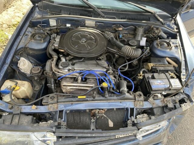 Синий Мазда 626, объемом двигателя 1.8 л и пробегом 150 тыс. км за 650 $, фото 4 на Automoto.ua