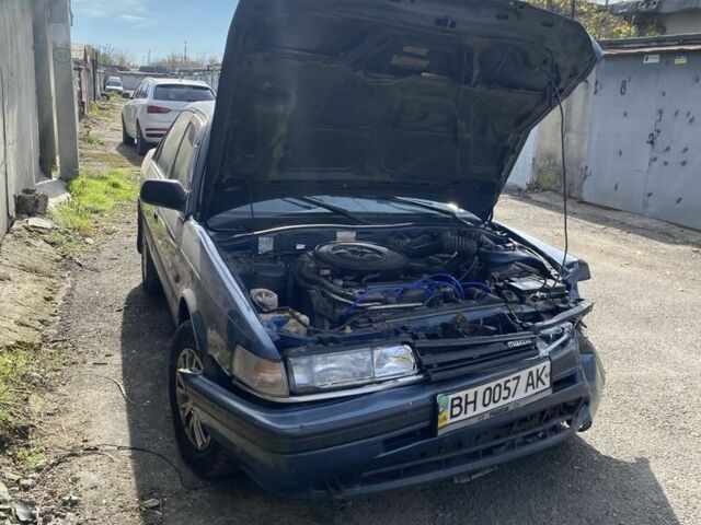 Синий Мазда 626, объемом двигателя 1.8 л и пробегом 150 тыс. км за 650 $, фото 1 на Automoto.ua