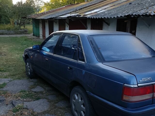 Синий Мазда 626, объемом двигателя 2 л и пробегом 10 тыс. км за 715 $, фото 1 на Automoto.ua
