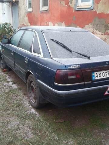 Синий Мазда 626, объемом двигателя 2 л и пробегом 55 тыс. км за 1500 $, фото 1 на Automoto.ua