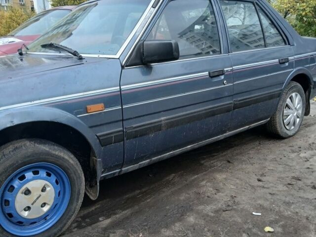 Синий Мазда 626, объемом двигателя 2 л и пробегом 292 тыс. км за 500 $, фото 3 на Automoto.ua