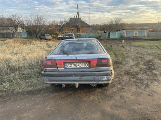 Синій Мазда 626, об'ємом двигуна 2 л та пробігом 300 тис. км за 714 $, фото 6 на Automoto.ua