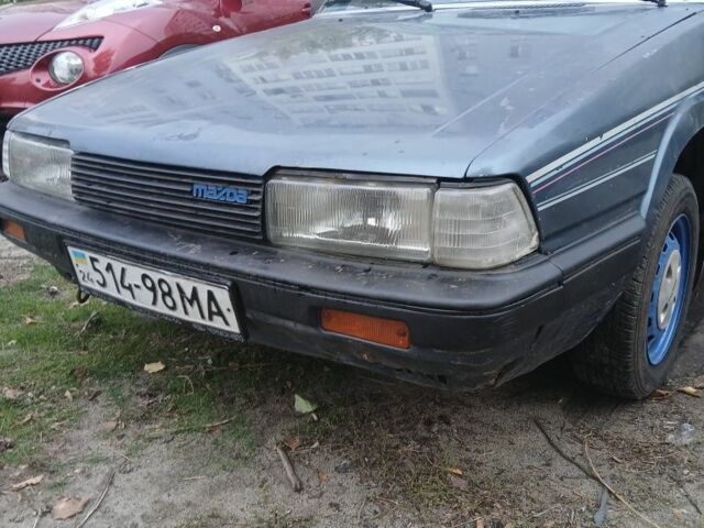 Синий Мазда 626, объемом двигателя 2 л и пробегом 292 тыс. км за 500 $, фото 1 на Automoto.ua