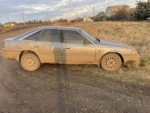 Синій Мазда 626, об'ємом двигуна 2 л та пробігом 300 тис. км за 714 $, фото 5 на Automoto.ua