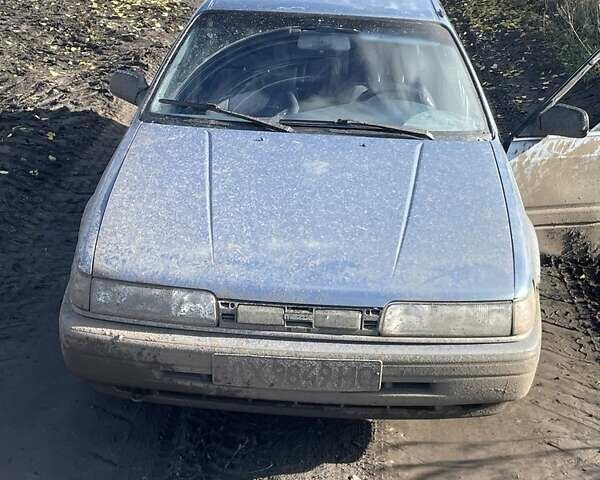 Синій Мазда 626, об'ємом двигуна 2 л та пробігом 300 тис. км за 714 $, фото 1 на Automoto.ua