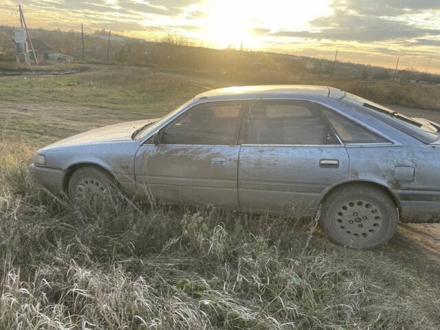 Синій Мазда 626, об'ємом двигуна 2 л та пробігом 300 тис. км за 714 $, фото 7 на Automoto.ua