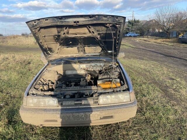 Синій Мазда 626, об'ємом двигуна 2 л та пробігом 300 тис. км за 714 $, фото 4 на Automoto.ua