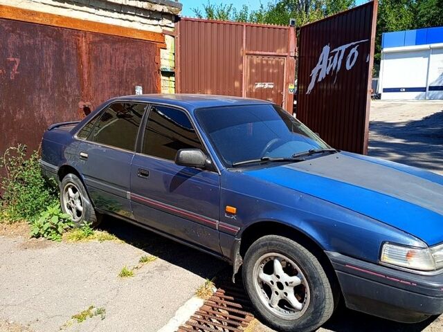 Синий Мазда 626, объемом двигателя 1.8 л и пробегом 1000 тыс. км за 950 $, фото 1 на Automoto.ua