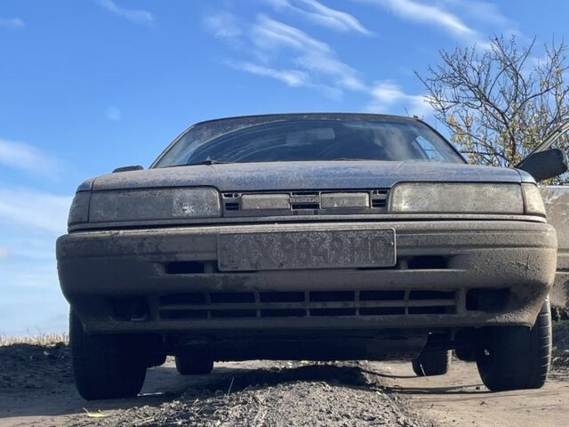 Синій Мазда 626, об'ємом двигуна 2 л та пробігом 300 тис. км за 714 $, фото 1 на Automoto.ua