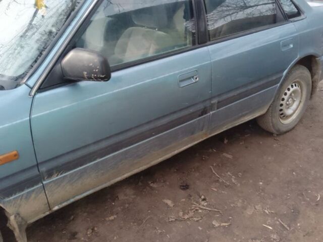 Синий Мазда 626, объемом двигателя 1.8 л и пробегом 1 тыс. км за 700 $, фото 3 на Automoto.ua