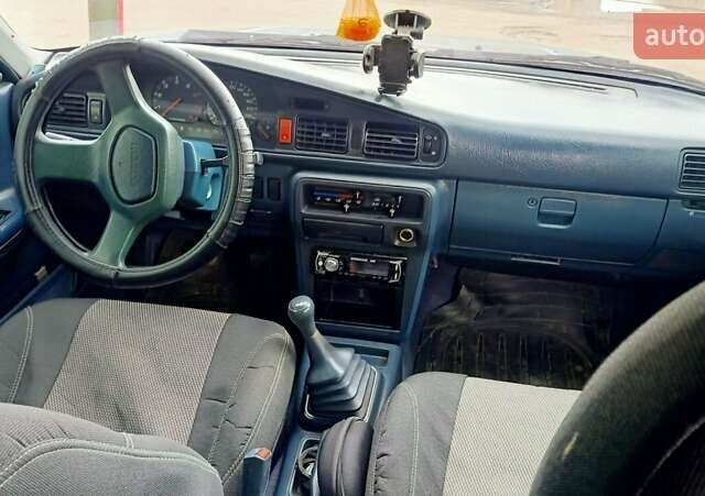 Синий Мазда 626, объемом двигателя 2.2 л и пробегом 430 тыс. км за 2400 $, фото 1 на Automoto.ua