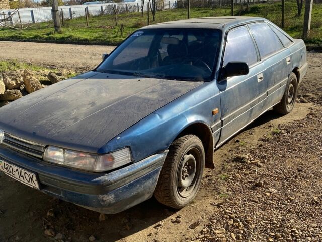 Синий Мазда 626, объемом двигателя 2 л и пробегом 3 тыс. км за 597 $, фото 2 на Automoto.ua