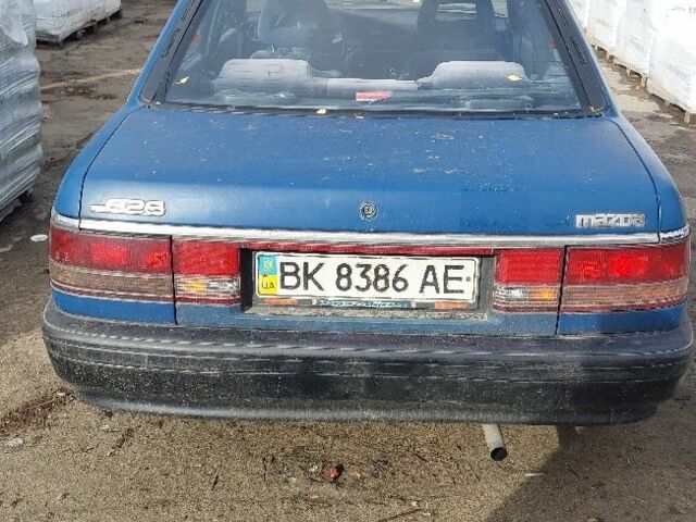 Синій Мазда 626, об'ємом двигуна 2 л та пробігом 100 тис. км за 850 $, фото 1 на Automoto.ua
