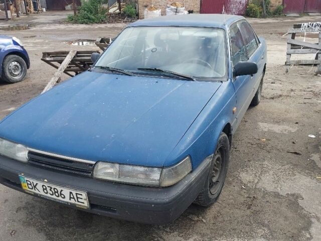 Синій Мазда 626, об'ємом двигуна 2 л та пробігом 100 тис. км за 850 $, фото 3 на Automoto.ua