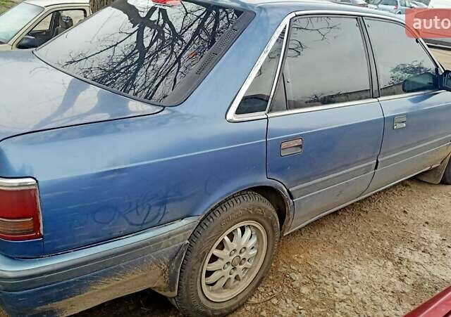 Синий Мазда 626, объемом двигателя 2.2 л и пробегом 430 тыс. км за 2400 $, фото 4 на Automoto.ua