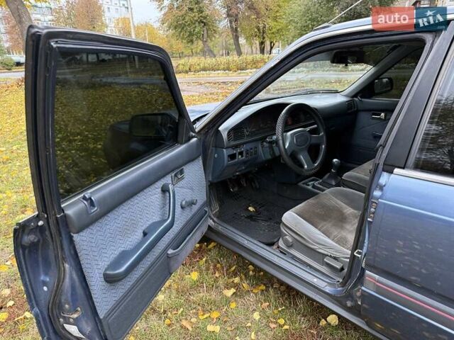 Синій Мазда 626, об'ємом двигуна 1.8 л та пробігом 90 тис. км за 850 $, фото 4 на Automoto.ua