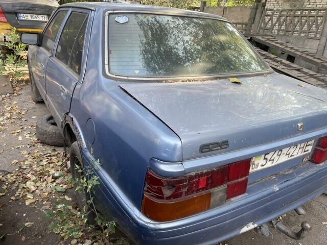 Синий Мазда 626, объемом двигателя 2 л и пробегом 150 тыс. км за 607 $, фото 2 на Automoto.ua