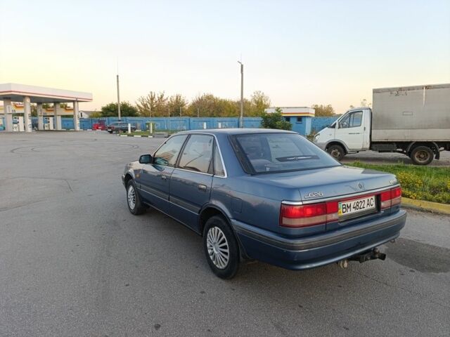 Синій Мазда 626, об'ємом двигуна 1.8 л та пробігом 286 тис. км за 900 $, фото 1 на Automoto.ua