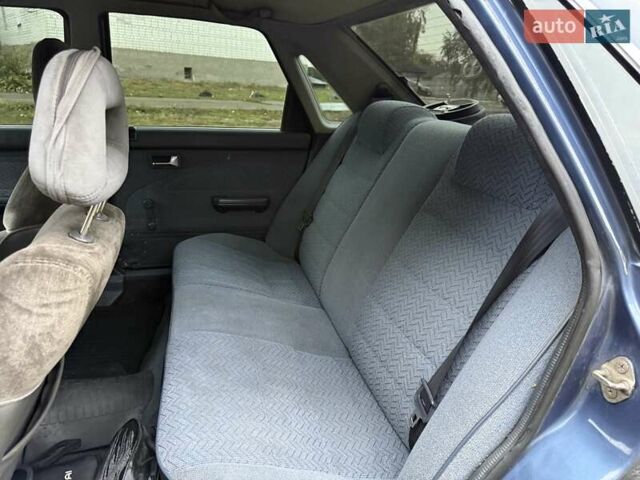 Синій Мазда 626, об'ємом двигуна 1.8 л та пробігом 90 тис. км за 850 $, фото 6 на Automoto.ua