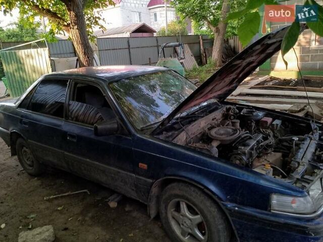 Синий Мазда 626, объемом двигателя 1.79 л и пробегом 200 тыс. км за 900 $, фото 4 на Automoto.ua