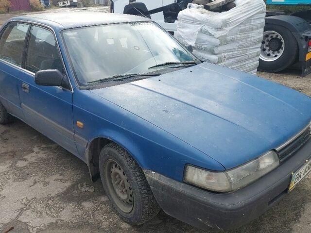 Синій Мазда 626, об'ємом двигуна 2 л та пробігом 100 тис. км за 850 $, фото 4 на Automoto.ua