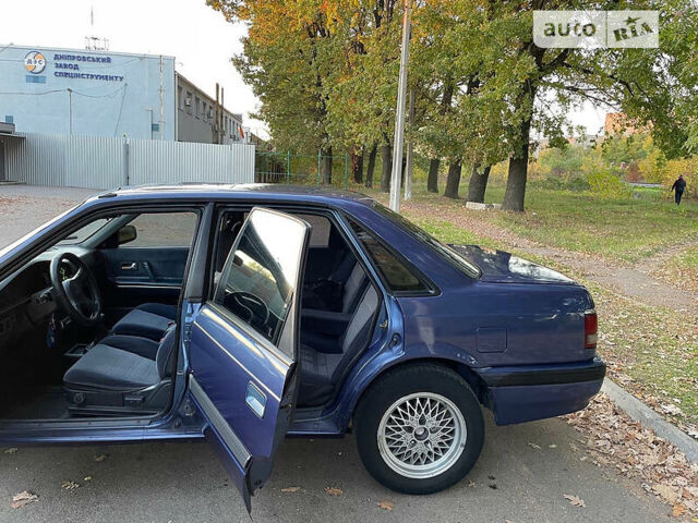 Синий Мазда 626, объемом двигателя 2 л и пробегом 340 тыс. км за 1999 $, фото 1 на Automoto.ua