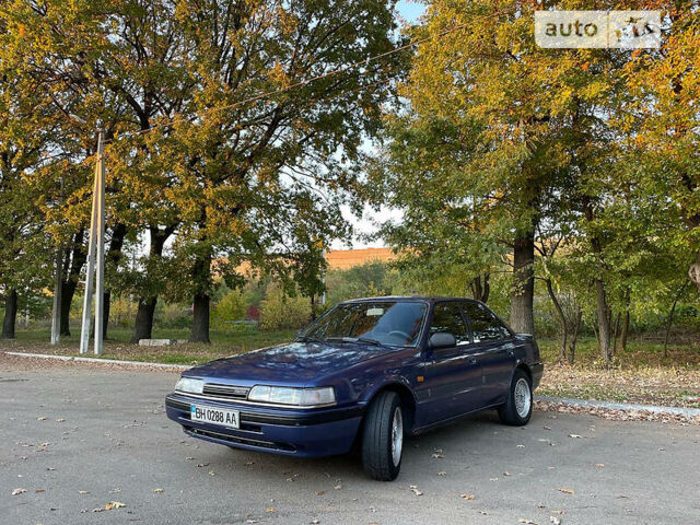 Синій Мазда 626, об'ємом двигуна 2 л та пробігом 340 тис. км за 1999 $, фото 5 на Automoto.ua