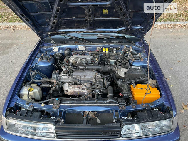 Синій Мазда 626, об'ємом двигуна 2 л та пробігом 340 тис. км за 1999 $, фото 4 на Automoto.ua