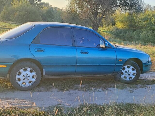 Синій Мазда 626, об'ємом двигуна 2 л та пробігом 442 тис. км за 600 $, фото 3 на Automoto.ua