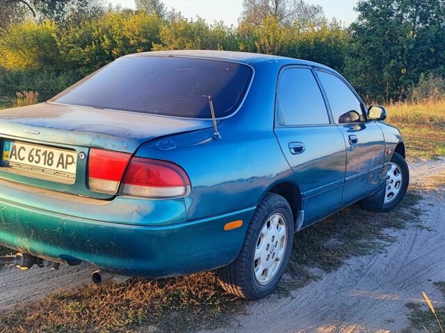 Синій Мазда 626, об'ємом двигуна 2 л та пробігом 442 тис. км за 600 $, фото 2 на Automoto.ua