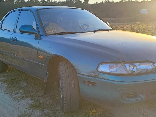 Синій Мазда 626, об'ємом двигуна 2 л та пробігом 442 тис. км за 600 $, фото 4 на Automoto.ua