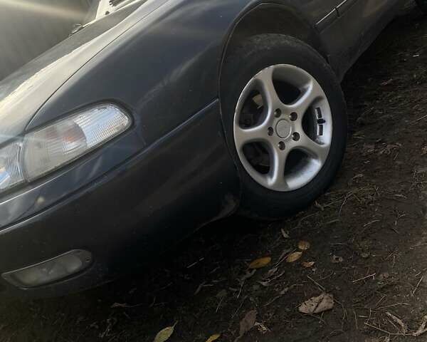 Синий Мазда 626, объемом двигателя 2 л и пробегом 514 тыс. км за 1950 $, фото 5 на Automoto.ua