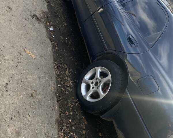 Синий Мазда 626, объемом двигателя 2 л и пробегом 514 тыс. км за 1950 $, фото 2 на Automoto.ua