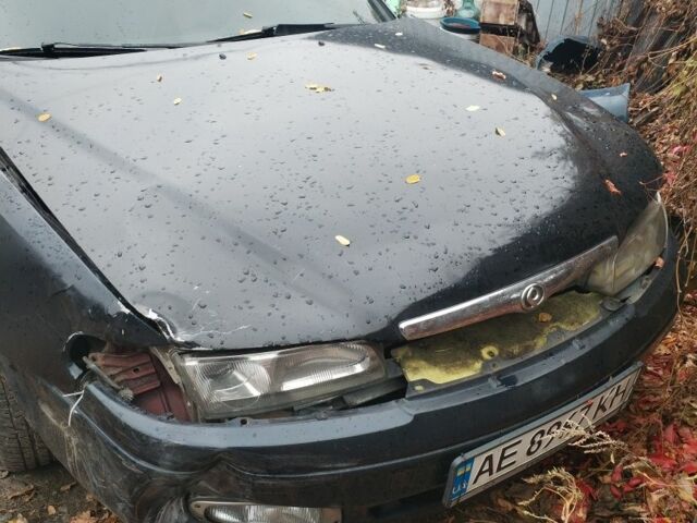 Синий Мазда 626, объемом двигателя 2 л и пробегом 400 тыс. км за 952 $, фото 2 на Automoto.ua