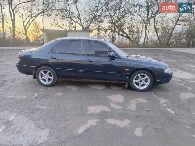 Синий Мазда 626, объемом двигателя 2 л и пробегом 515 тыс. км за 1999 $, фото 7 на Automoto.ua
