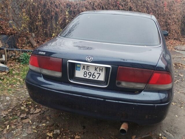 Синий Мазда 626, объемом двигателя 2 л и пробегом 400 тыс. км за 952 $, фото 3 на Automoto.ua
