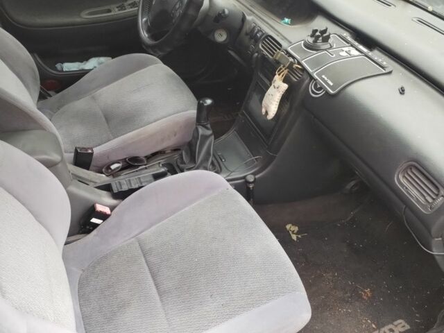 Синий Мазда 626, объемом двигателя 2 л и пробегом 400 тыс. км за 952 $, фото 9 на Automoto.ua