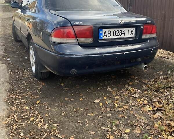 Синий Мазда 626, объемом двигателя 2 л и пробегом 514 тыс. км за 1950 $, фото 4 на Automoto.ua