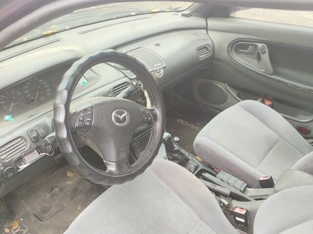 Синий Мазда 626, объемом двигателя 2 л и пробегом 400 тыс. км за 952 $, фото 7 на Automoto.ua