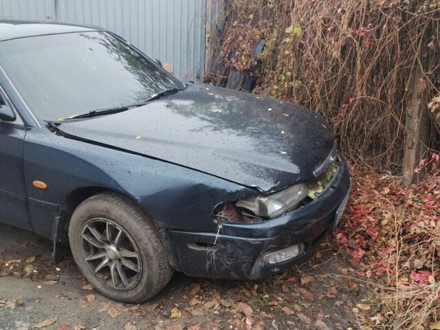 Синий Мазда 626, объемом двигателя 2 л и пробегом 400 тыс. км за 952 $, фото 1 на Automoto.ua