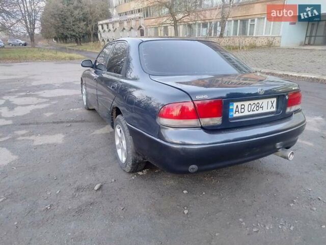 Синий Мазда 626, объемом двигателя 2 л и пробегом 515 тыс. км за 1999 $, фото 3 на Automoto.ua