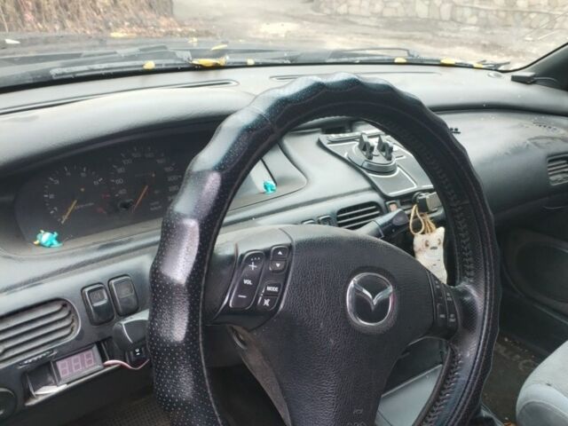 Синий Мазда 626, объемом двигателя 2 л и пробегом 400 тыс. км за 952 $, фото 6 на Automoto.ua