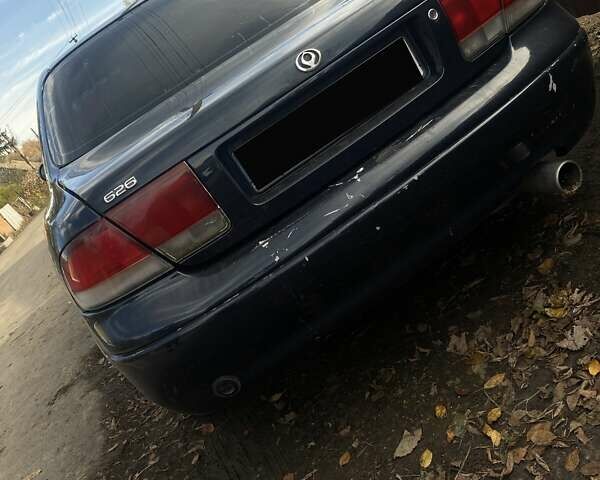 Синий Мазда 626, объемом двигателя 2 л и пробегом 514 тыс. км за 1750 $, фото 13 на Automoto.ua