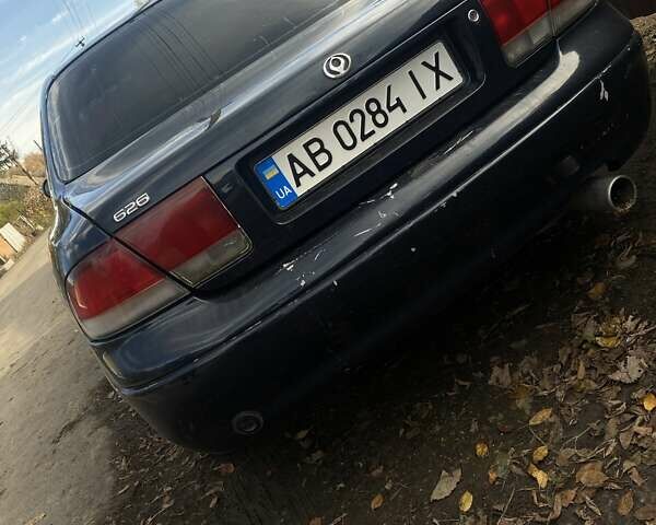 Синий Мазда 626, объемом двигателя 2 л и пробегом 514 тыс. км за 1950 $, фото 7 на Automoto.ua
