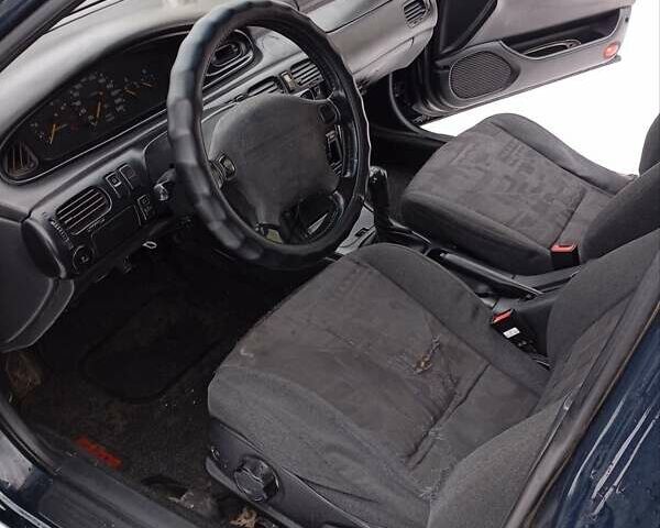 Синій Мазда 626, об'ємом двигуна 2 л та пробігом 515 тис. км за 2400 $, фото 4 на Automoto.ua